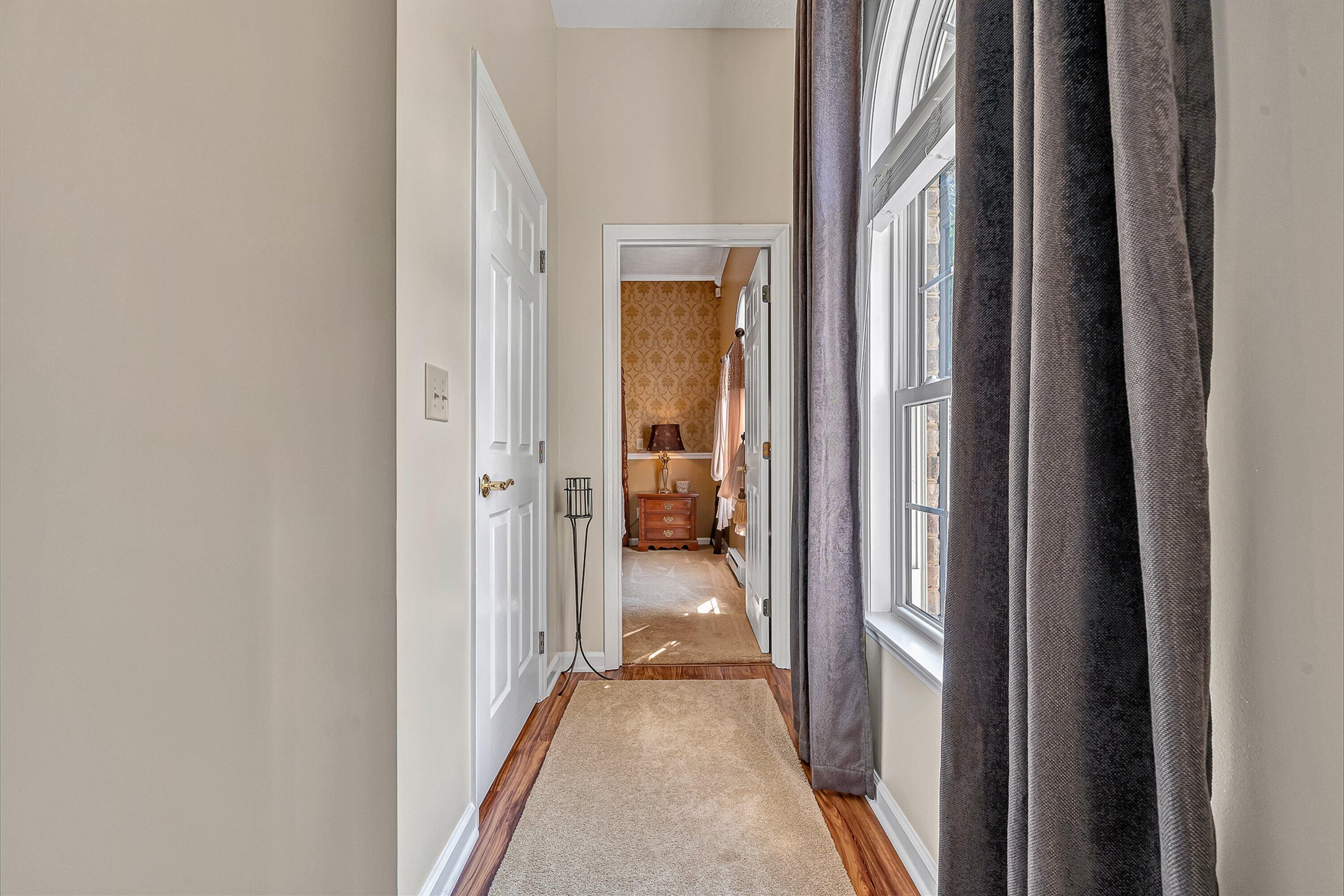 4723 Norwood Street Southwest Roanoke, VA 24018 - Photo 23 of 84 a view of a hallway with a livingroom and a bathroom