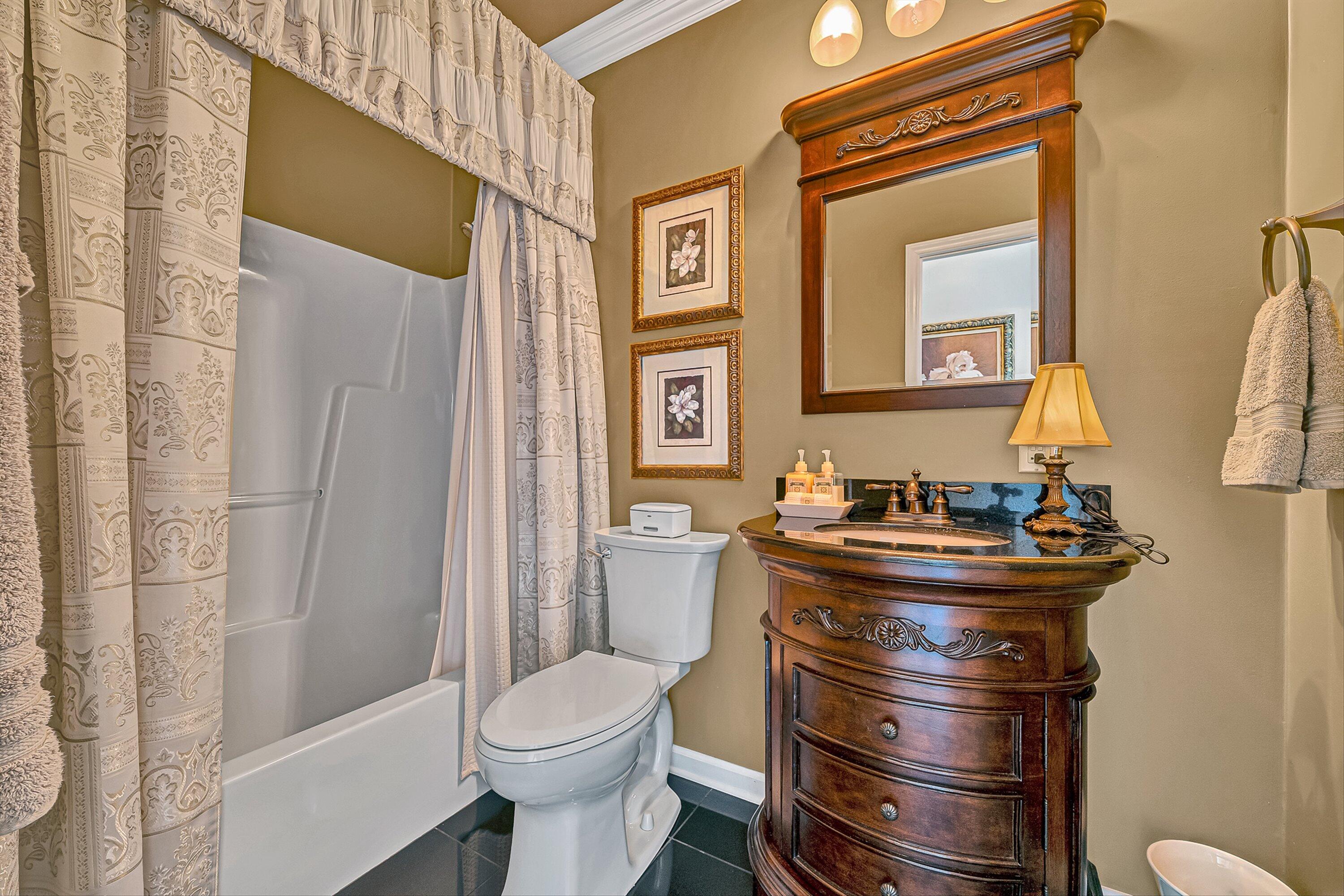 4723 Norwood Street Southwest Roanoke, VA 24018 - Photo 27 of 84 a bathroom with a sink a toilet and shower