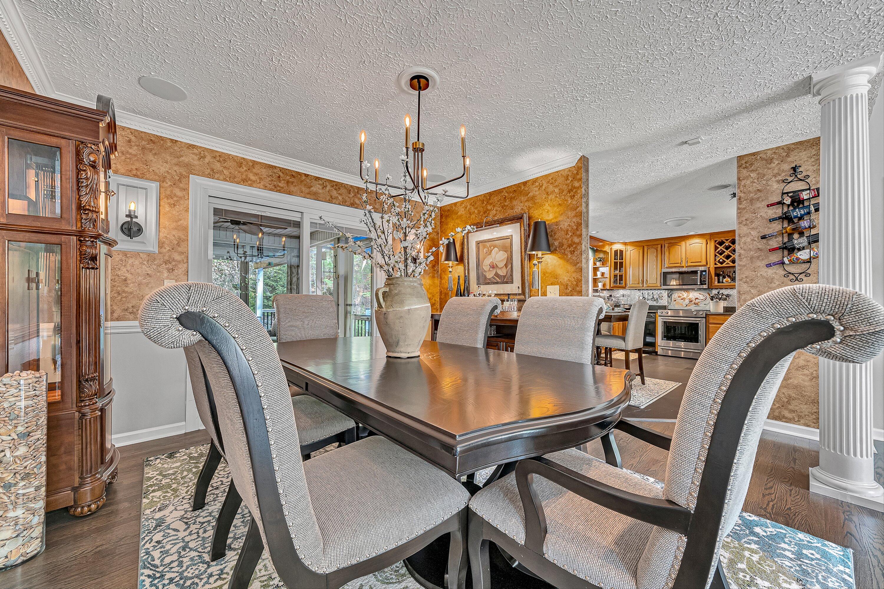4723 Norwood Street Southwest Roanoke, VA 24018 - Photo 37 of 84 a dining room with furniture a chandelier and wooden floor