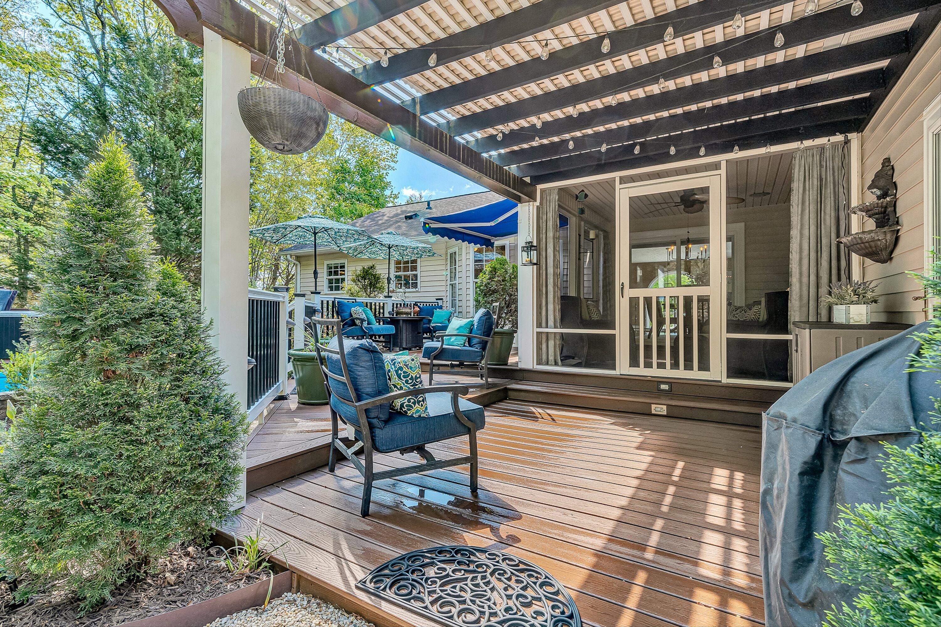 4723 Norwood Street Southwest Roanoke, VA 24018 - Photo 64 of 84 a view of a chairs and table in the patio next to a yard