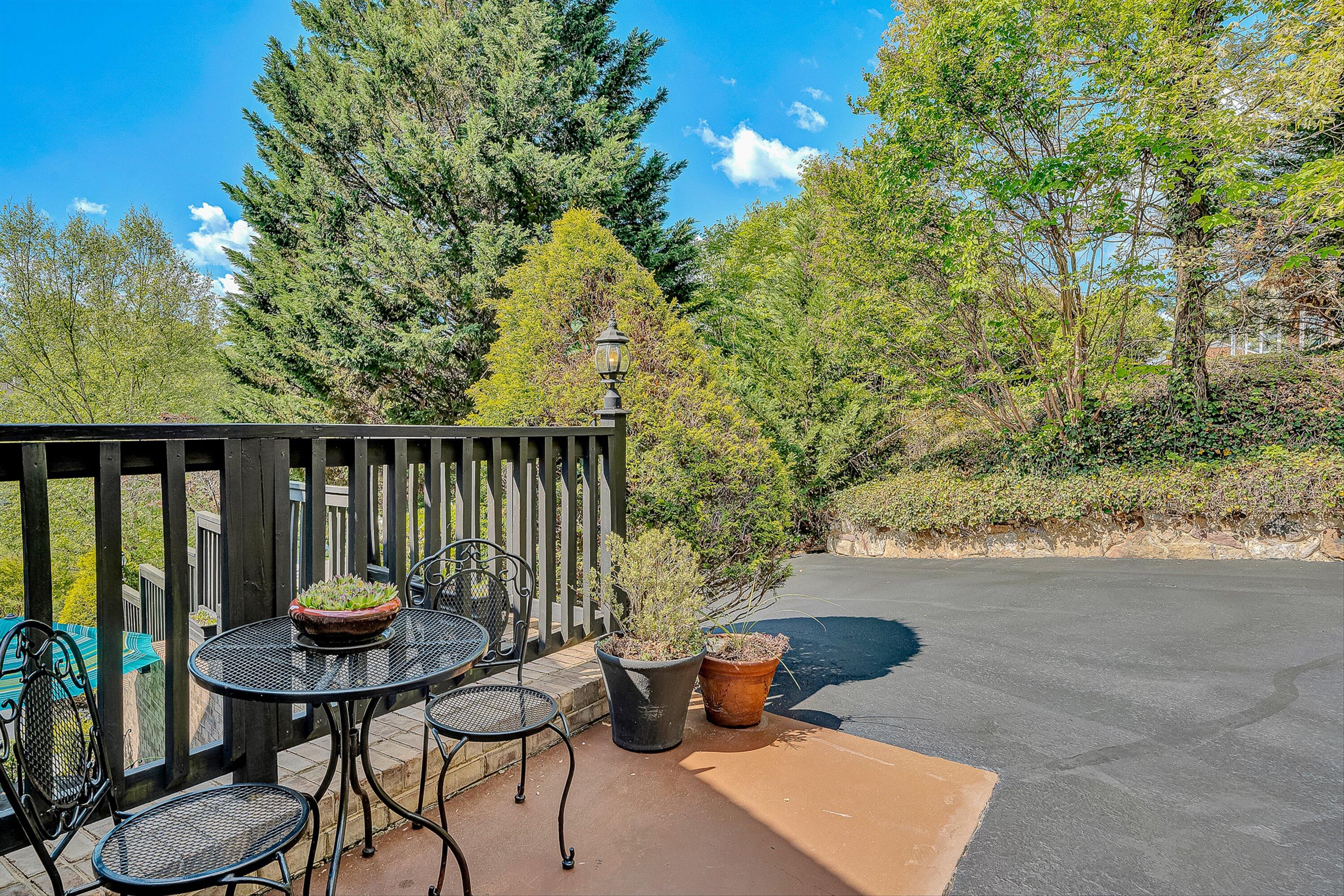 4723 Norwood Street Southwest Roanoke, VA 24018 - Photo 75 of 84 a backyard of a house with table and chairs and potted plants