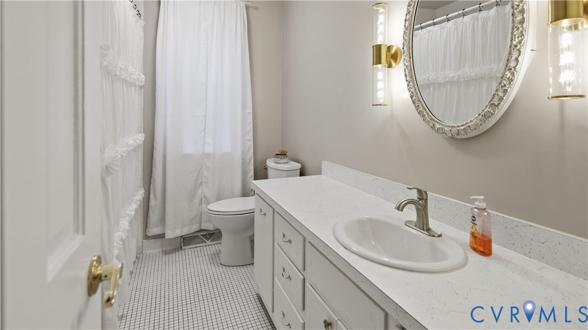 11430 Marsden Road Chester, VA 23831 - Photo 21 of 33 Hall Bathroom on upper level - tiled floor brushed