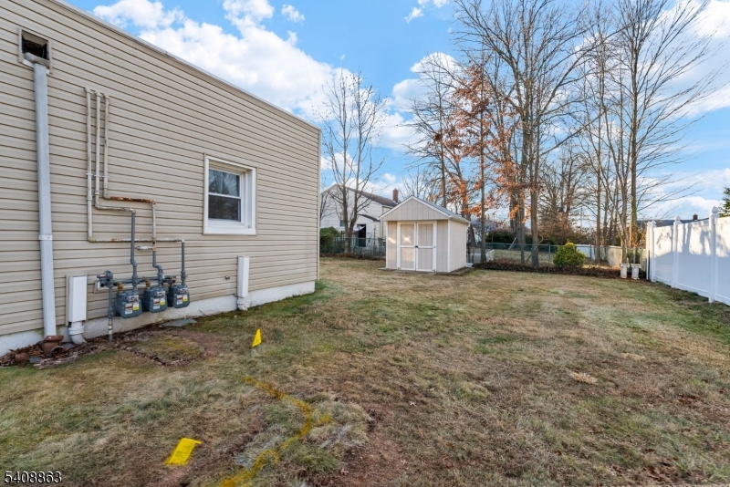 973 Ellis Parkway Edison, NJ 08820 - Photo 27 of 33 a house view with a backyard space