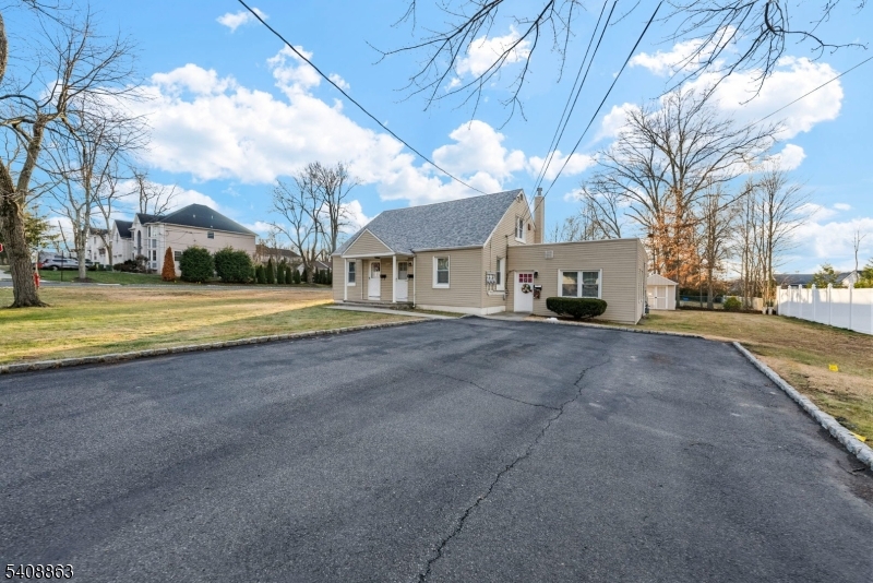 973 Ellis Parkway Edison, NJ 08820 - Photo 31 of 33 a view of road with large trees