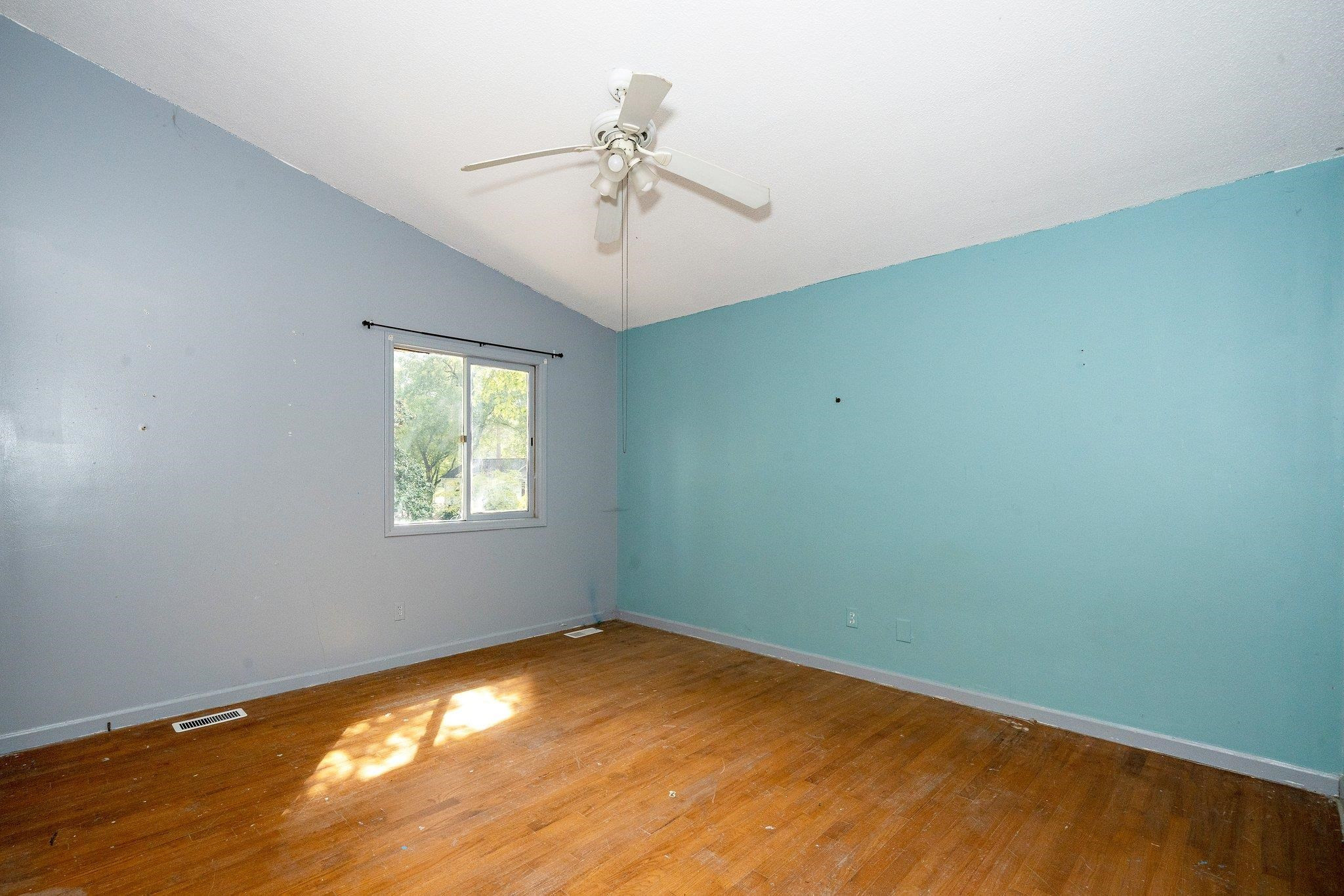1307 Brookgreen Drive Cary, NC 27511 - Photo 19 of 26 wooden floor in an empty room with a window