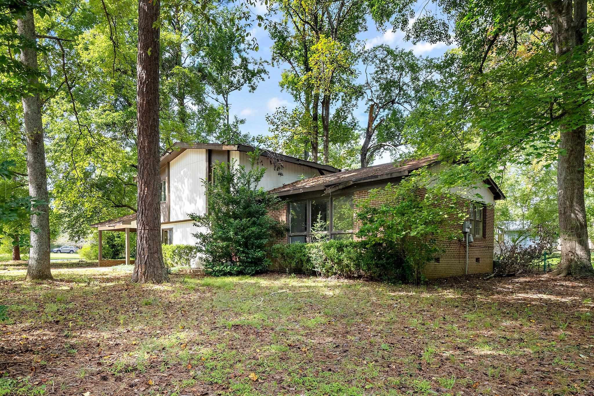 1307 Brookgreen Drive Cary, NC 27511 - Photo 24 of 26 a house view with a backyard space