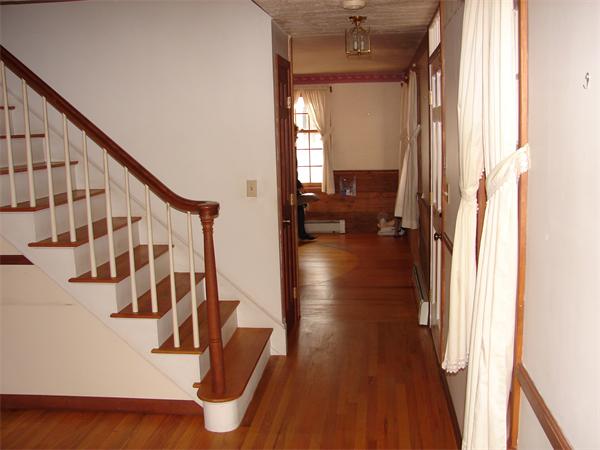 47 Heywood Road Sterling, MA 01564 - Photo 6 of 11 a view of entryway and hall with wooden floor