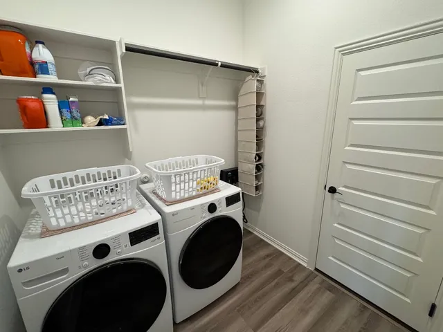 a utility room with dryer and washer