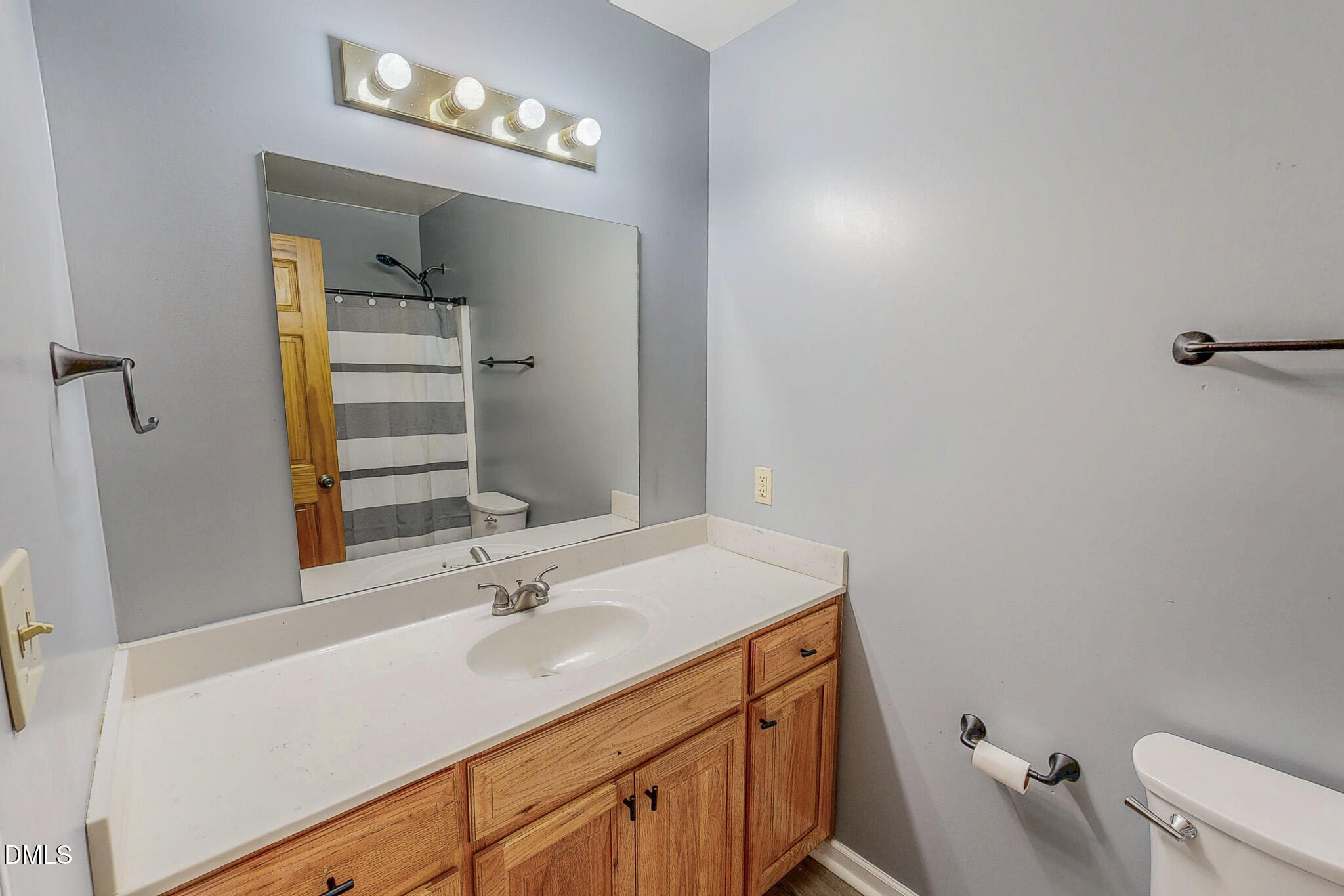 111 Fox Crossing Drive Roxboro, NC 27574 - Photo 18 of 25 a bathroom with a sink vanity granite and toilet