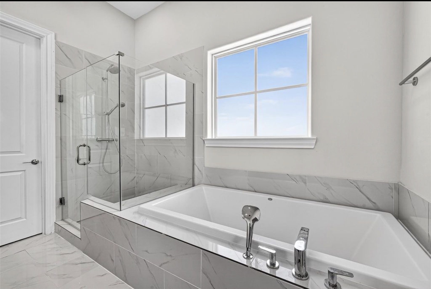 815 Bringhurst Street Houston, TX 77020 - Photo 13 of 15 a bathroom with a tub and a shower