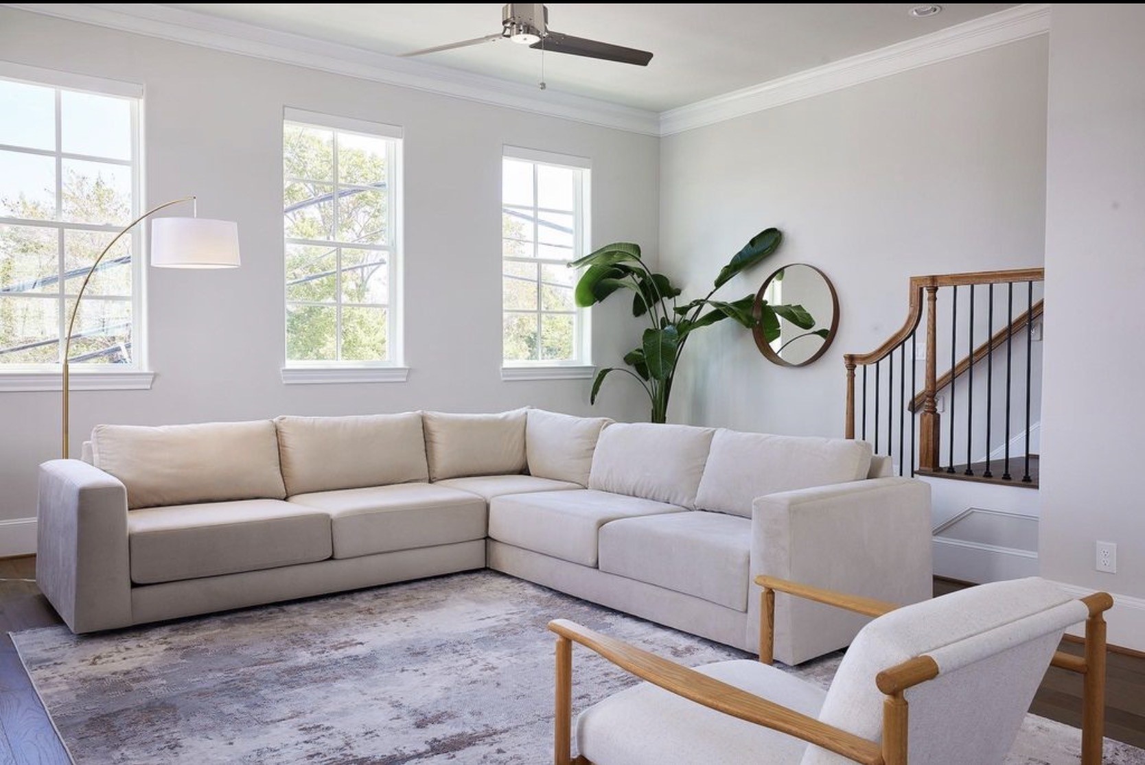 815 Bringhurst Street Houston, TX 77020 - Photo 5 of 15 a living room with furniture stairs and a window