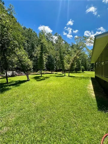 a view of a golf course with a swimming pool