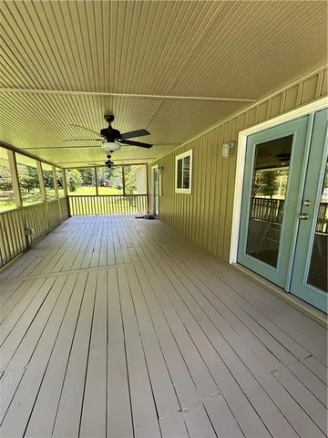 a view of gallery with wooden floor