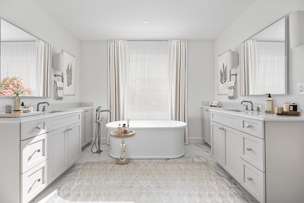 20 Common Court, Unit 20 Lexington, MA 02421 - Photo 14 of 27 a spacious bathroom with a double vanity sink mirror double and bathtub