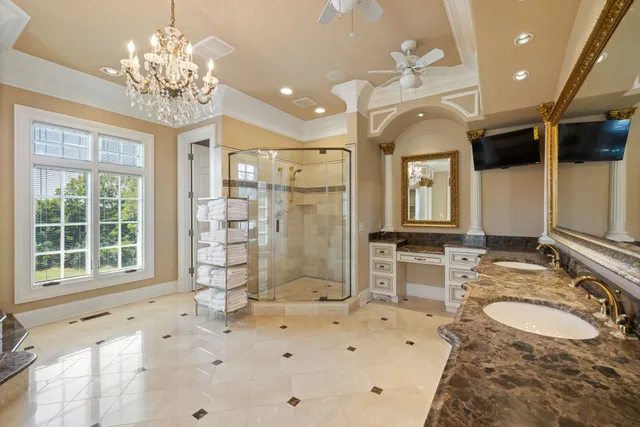 a room with pool table and windows