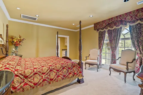 a kitchen with granite countertop a sink stove and refrigerator