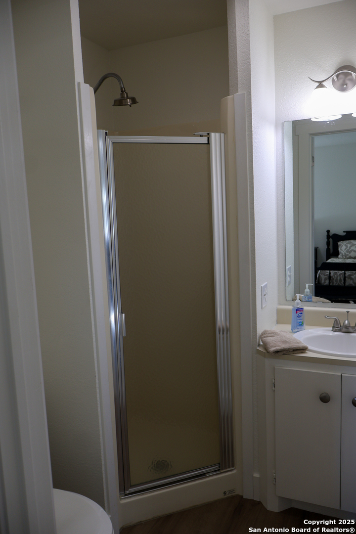 1031 Shin Oak Road Menard, TX 76859 - Photo 23 of 31 a bathroom with a shower and a sink
