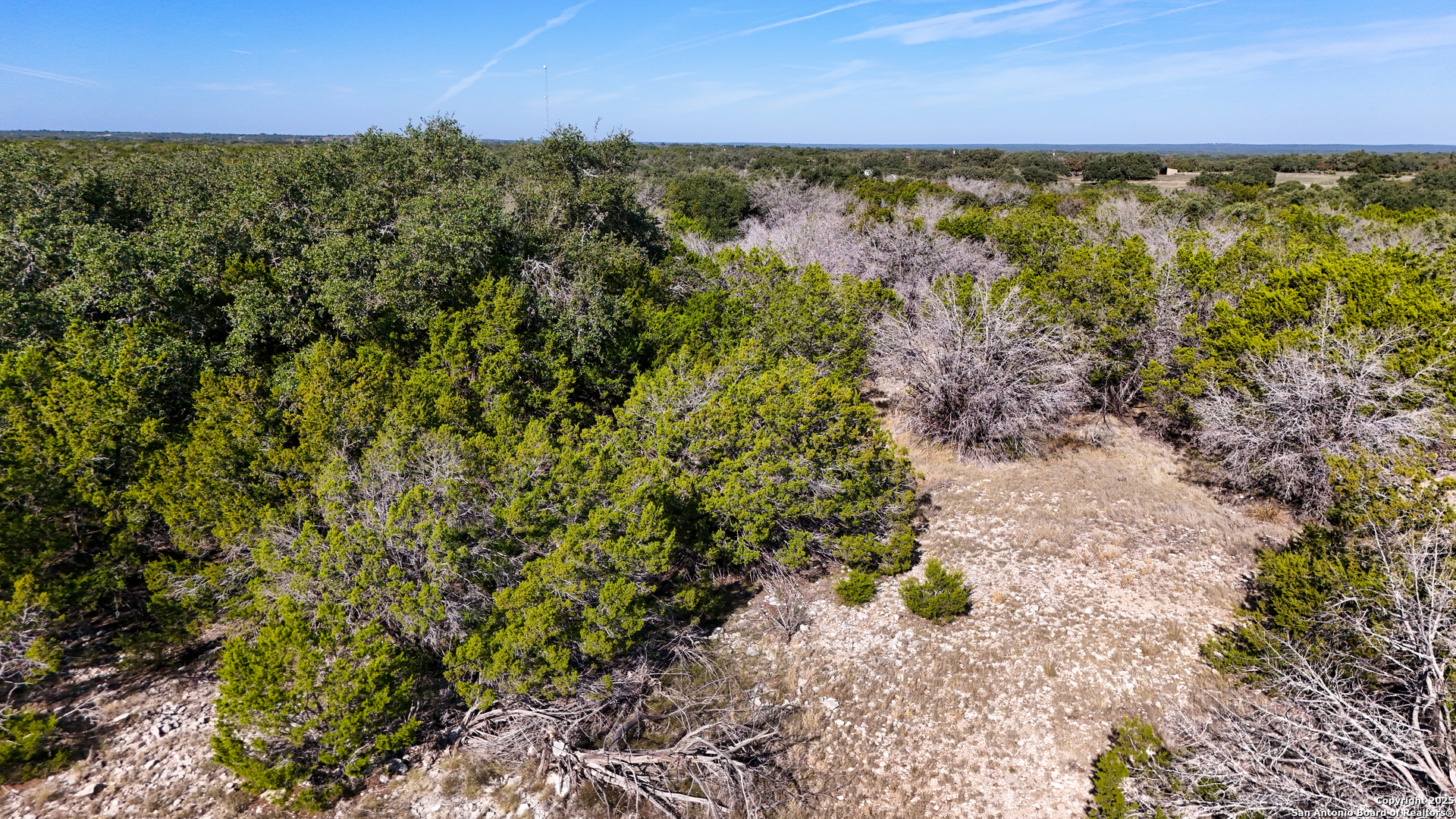 1031 Shin Oak Road Menard, TX 76859 - Photo 29 of 31 a view of a lake with an outdoor space