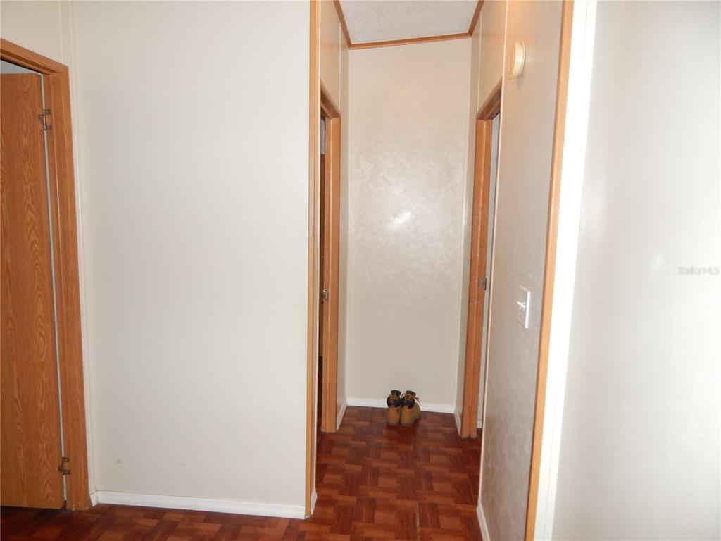 900 Columbia Avenue St. Cloud, FL 34769 - Photo 13 of 19 a view of a bathroom with a glass shower door