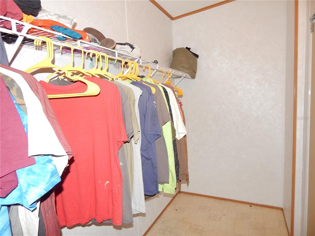 900 Columbia Avenue St. Cloud, FL 34769 - Photo 9 of 19 a bedroom with a bed and a window