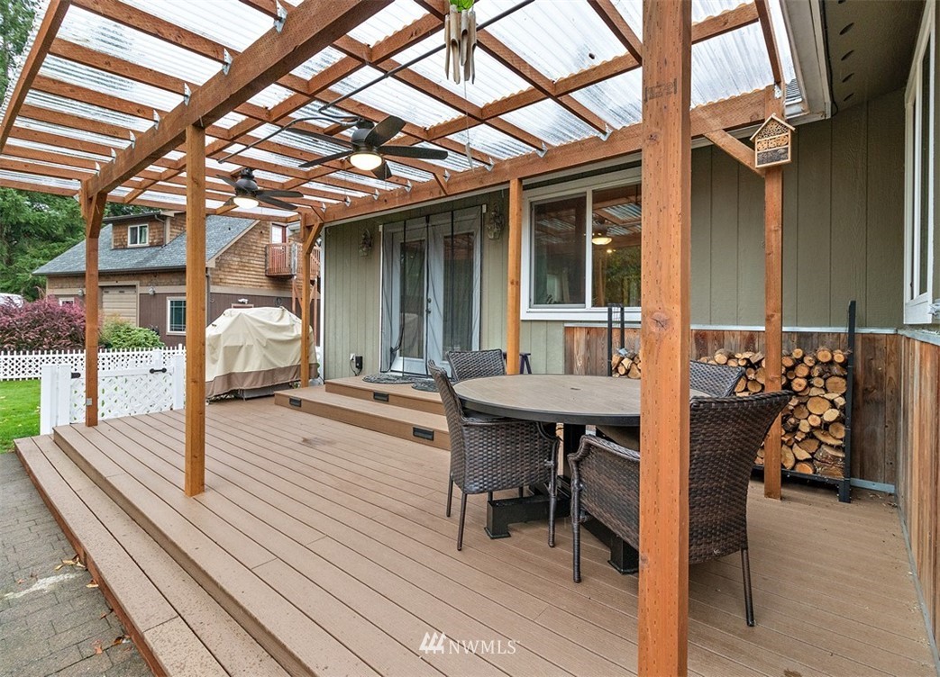 18811 Nutmeg Street Southwest Rochester, WA 98579 - Photo 18 of 25 a house view with a seating space