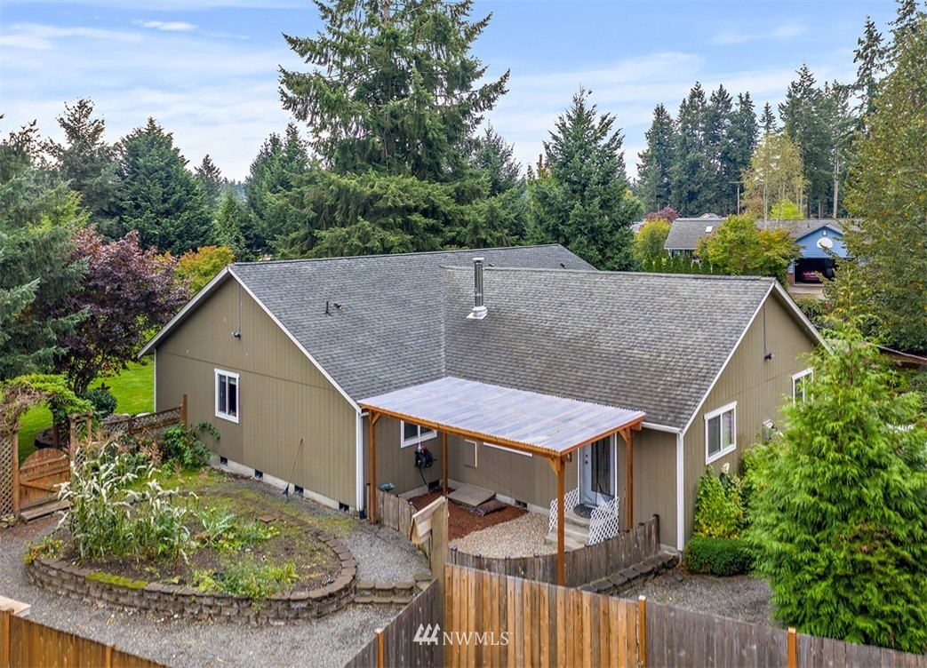 18811 Nutmeg Street Southwest Rochester, WA 98579 - Photo 3 of 25 an aerial view of a house with a yard