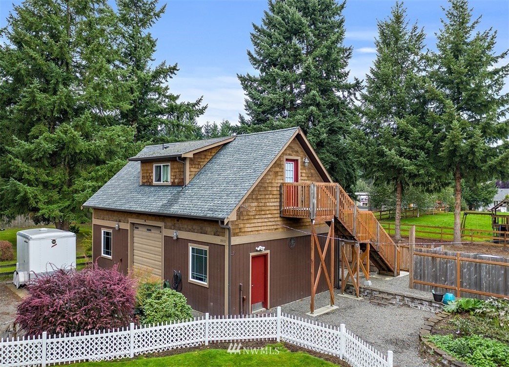 18811 Nutmeg Street Southwest Rochester, WA 98579 - Photo 5 of 25 a view of a house with a yard