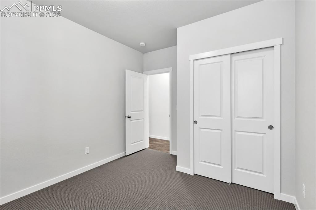 13633 Flurry Heights Colorado Springs, CO 80921 - Photo 25 of 31 a view of an empty room