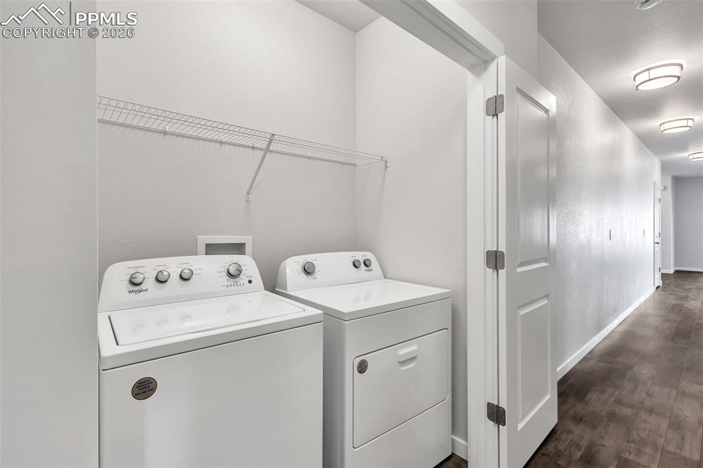 13633 Flurry Heights Colorado Springs, CO 80921 - Photo 29 of 31 a utility room with dryer and washer