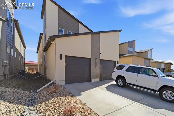 a car parked in front of a house