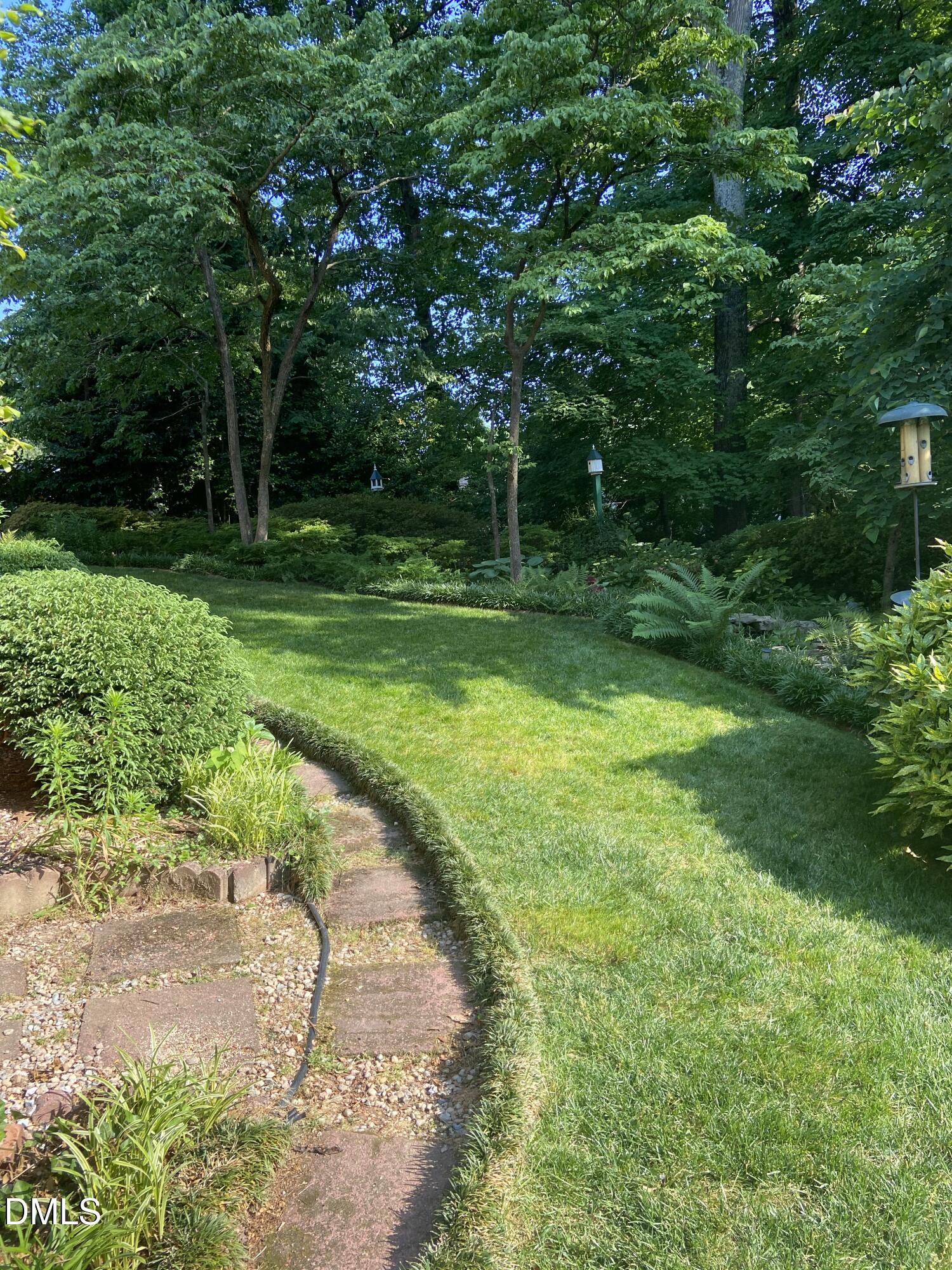 1100 Sudbury Court Raleigh, NC 27609 - Photo 11 of 56 a view of a park with a trees in the background