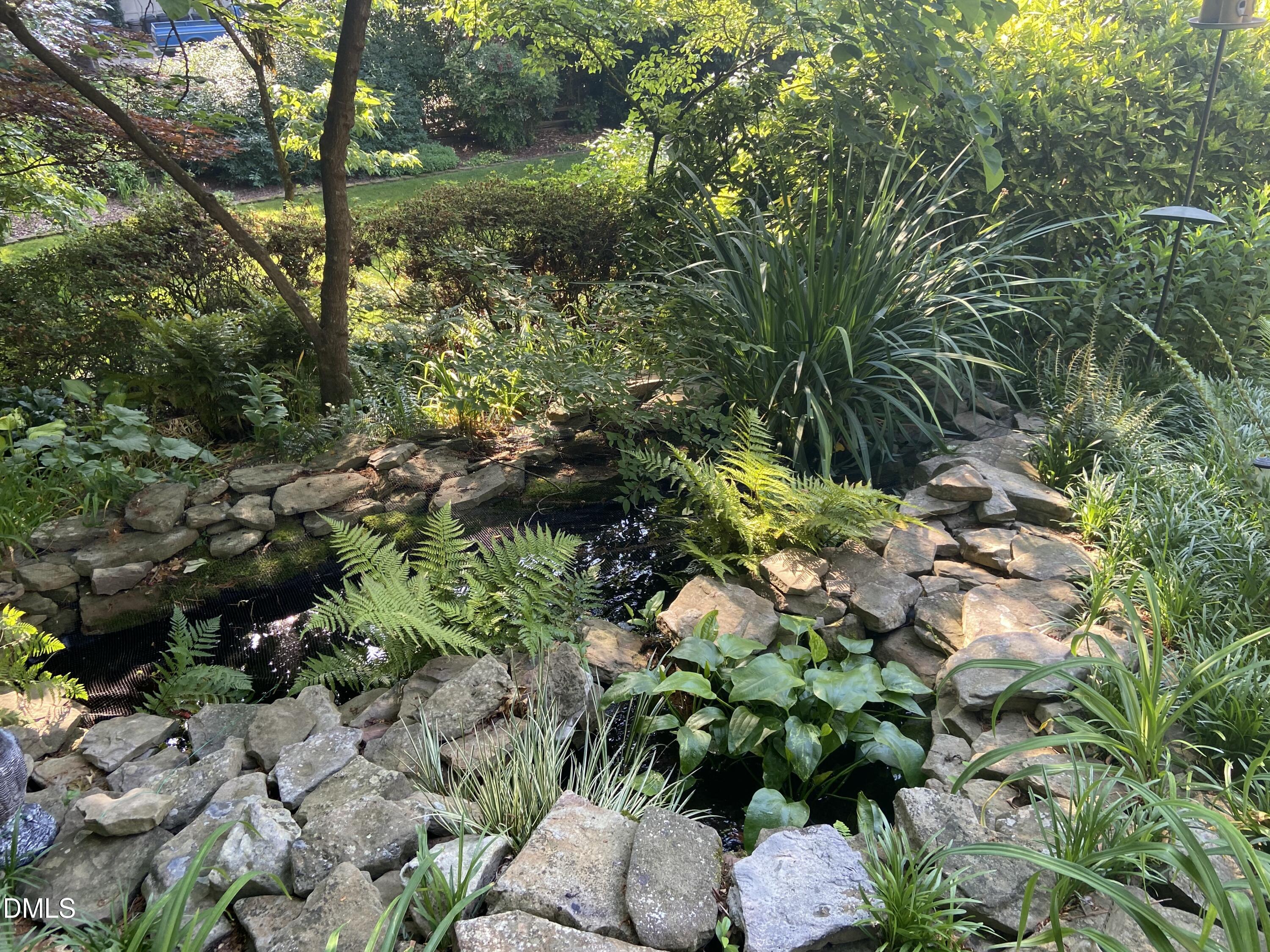 1100 Sudbury Court Raleigh, NC 27609 - Photo 12 of 56 a view of a garden