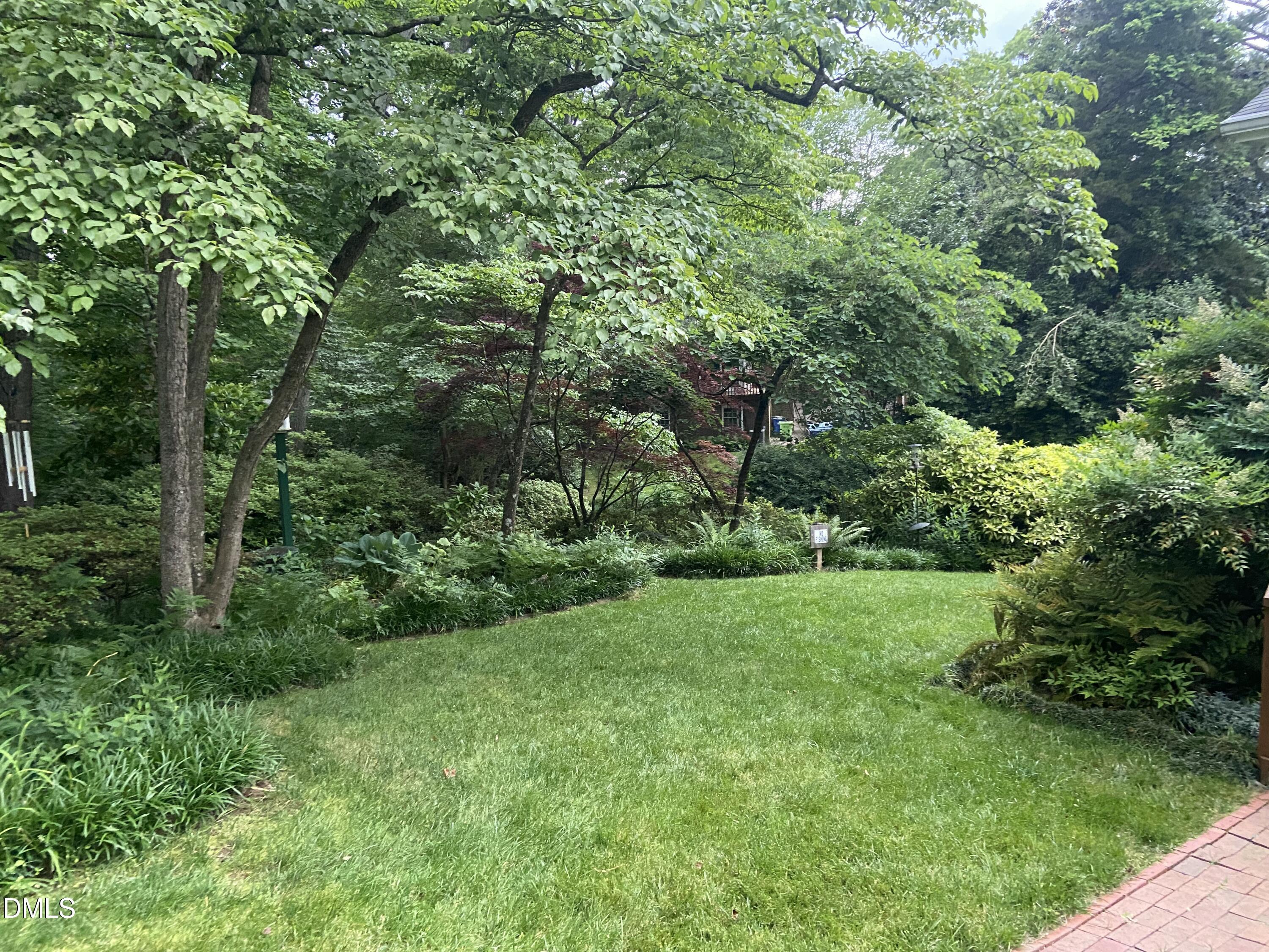 1100 Sudbury Court Raleigh, NC 27609 - Photo 17 of 56 a view of an outdoor space and a yard