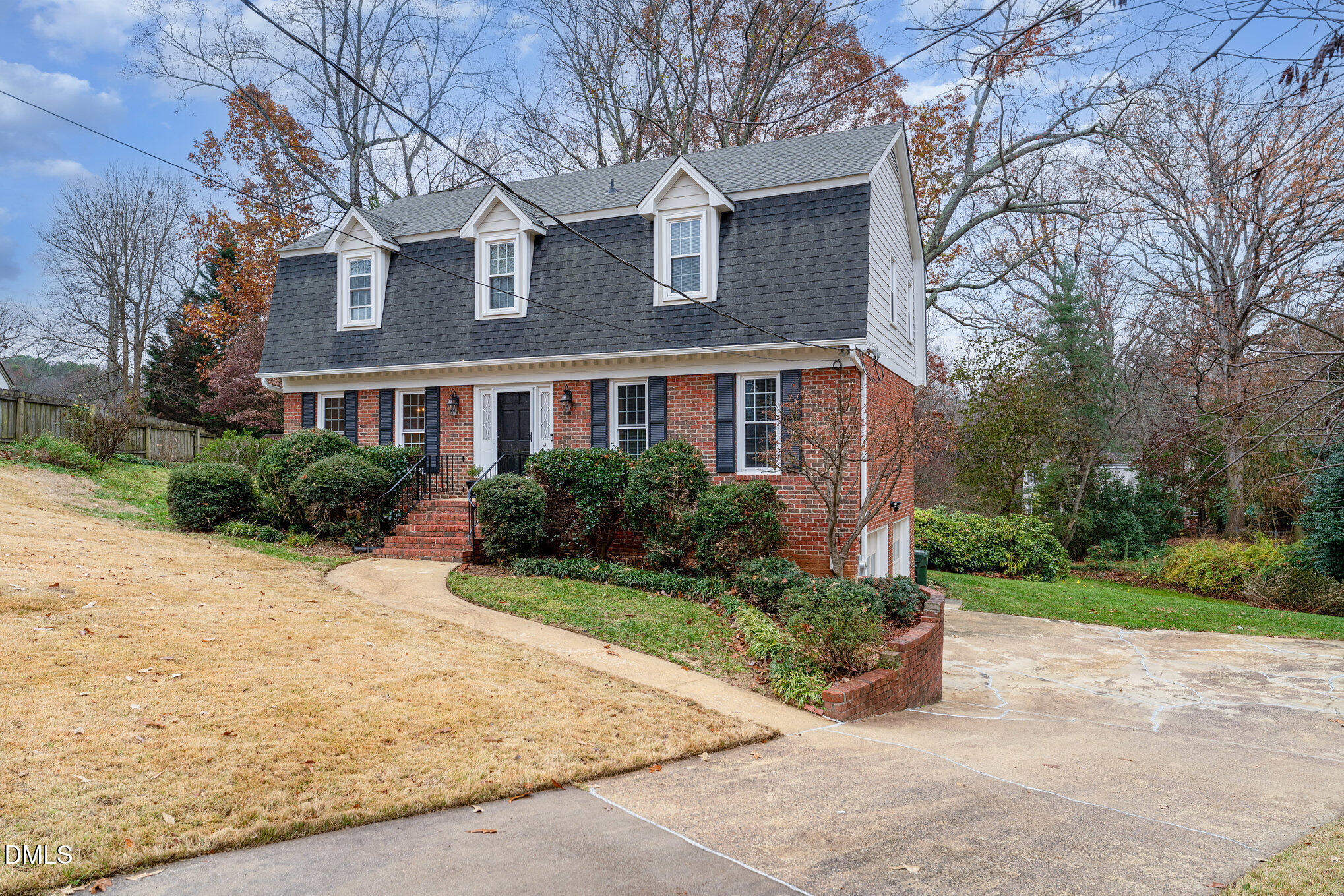 1100 Sudbury Court Raleigh, NC 27609 - Photo 22 of 56 a front view of a house with garden