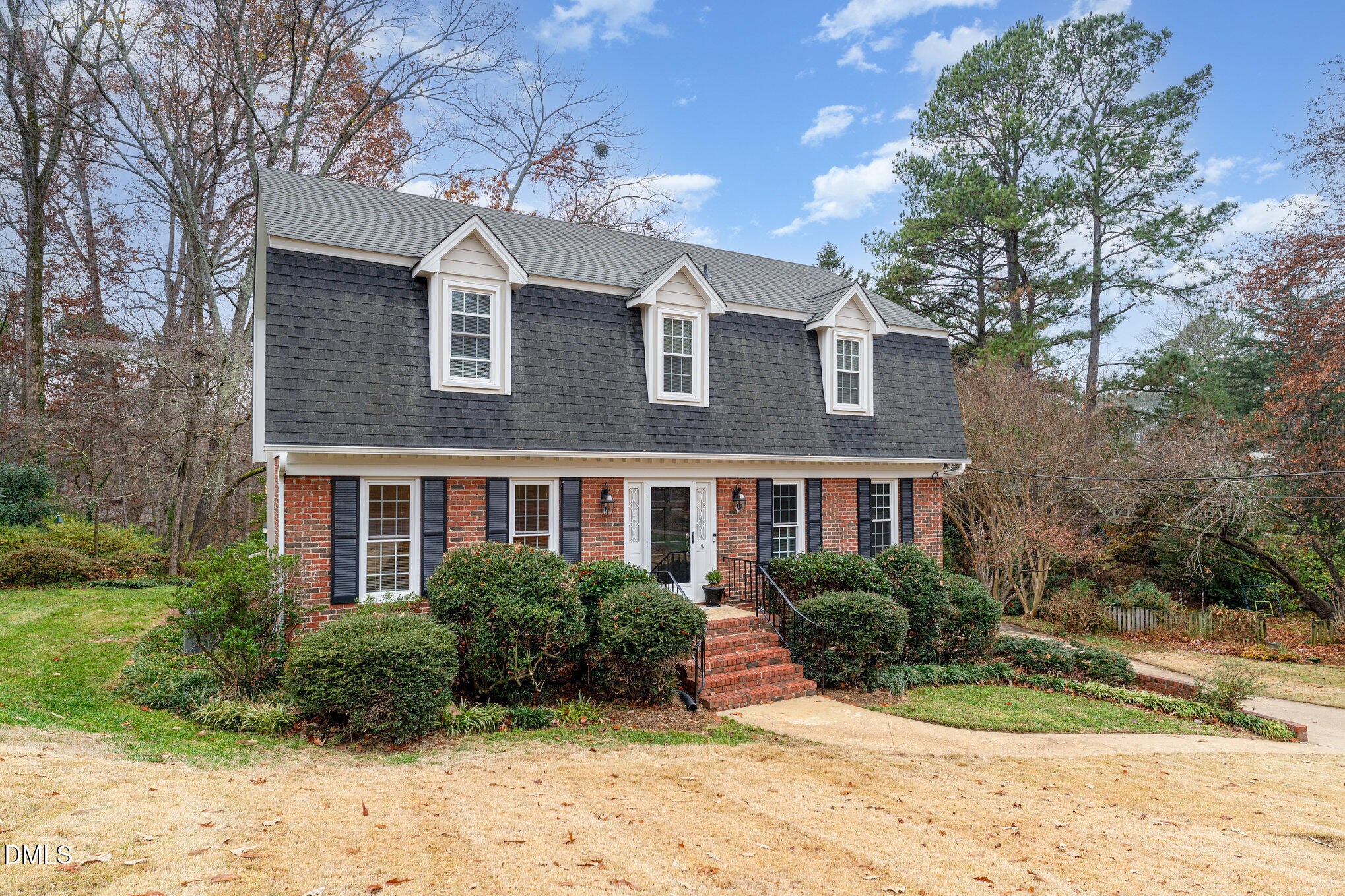 1100 Sudbury Court Raleigh, NC 27609 - Photo 23 of 56 a front view of a house with a yard