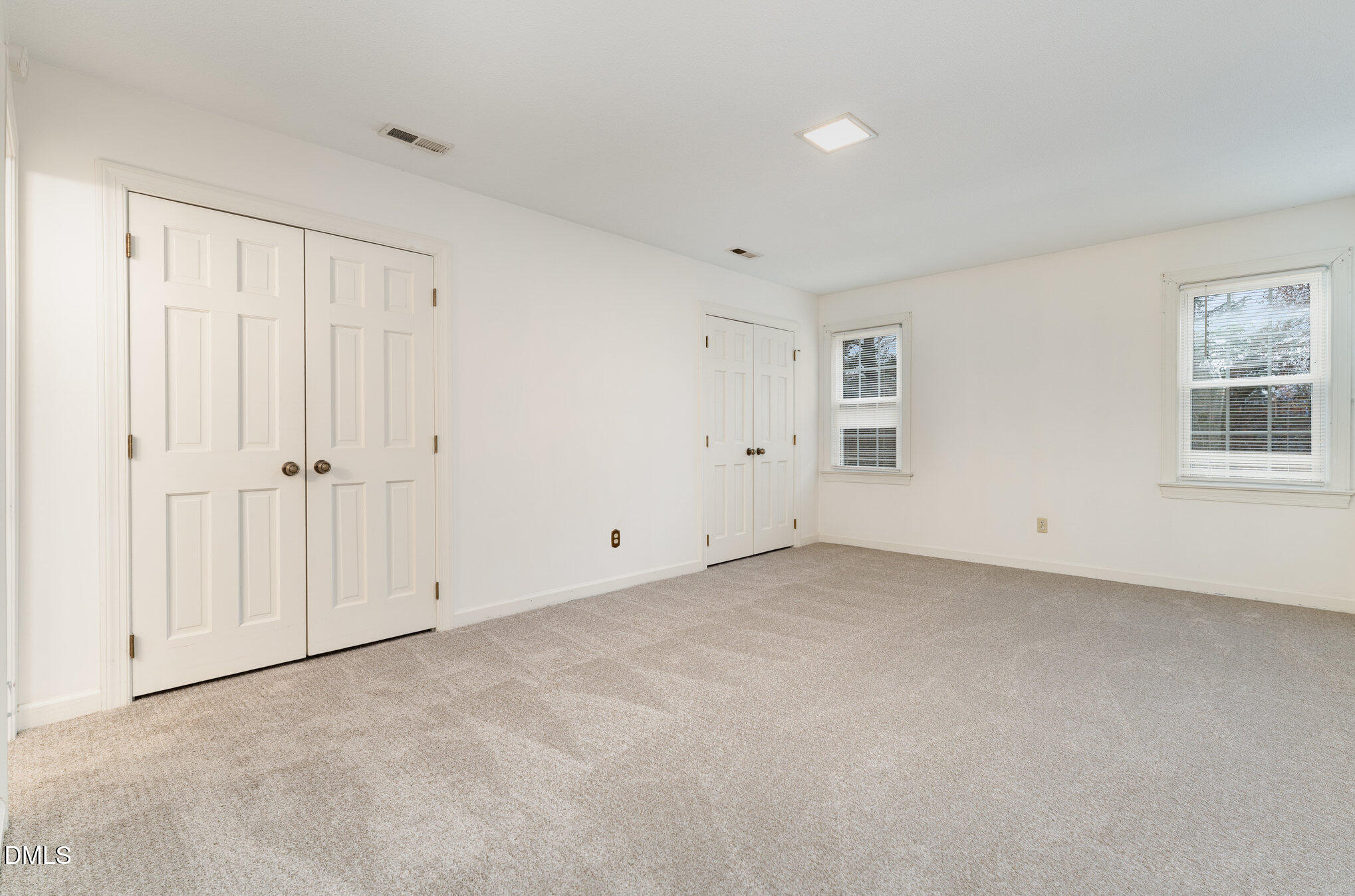 1100 Sudbury Court Raleigh, NC 27609 - Photo 39 of 56 a view of an empty room with a window