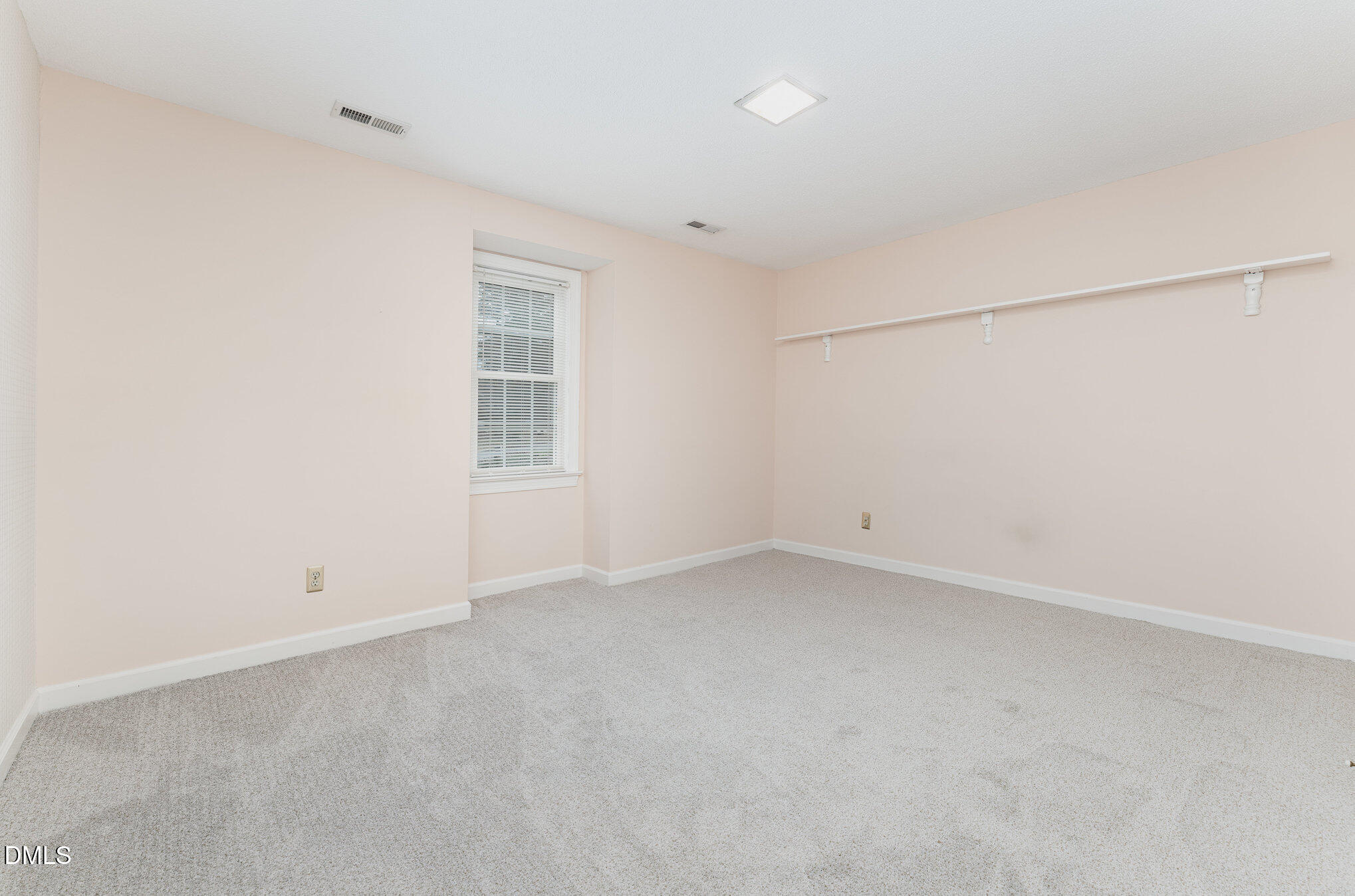 1100 Sudbury Court Raleigh, NC 27609 - Photo 42 of 56 a view of an empty room with a window