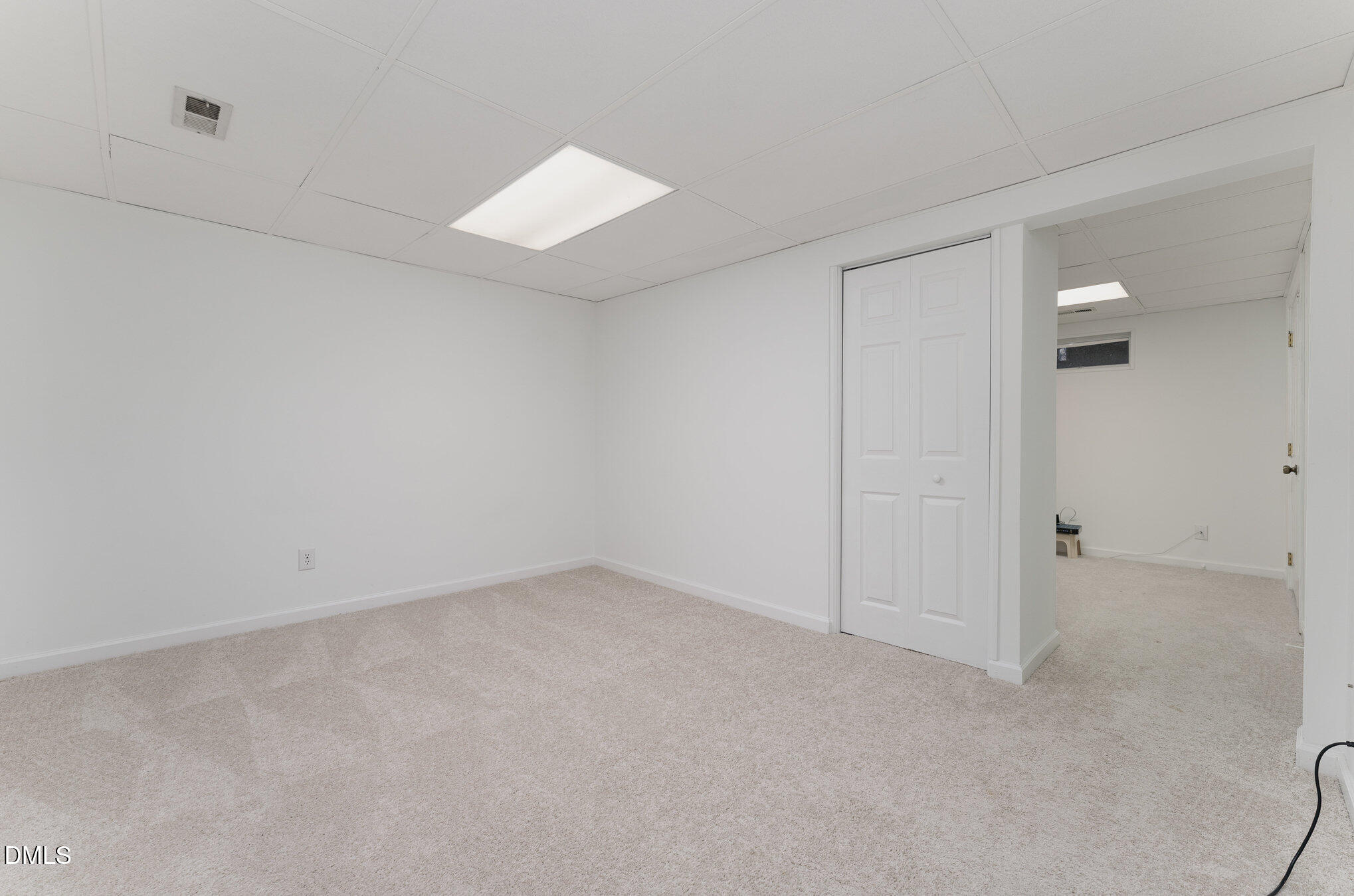 1100 Sudbury Court Raleigh, NC 27609 - Photo 49 of 56 an empty room with windows