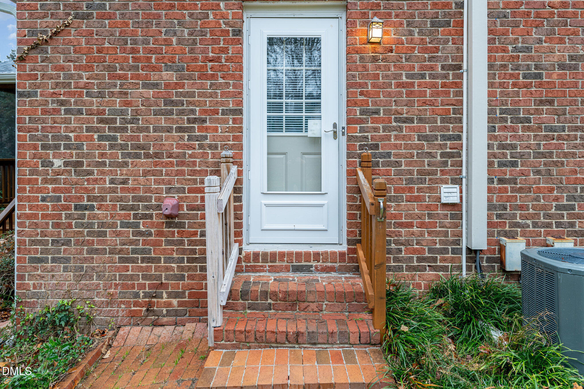 1100 Sudbury Court Raleigh, NC 27609 - Photo 52 of 56 a view of a brick door of the house