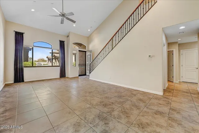 a view of a livingroom with a staircase