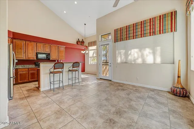 a view of kitchen with furniture and window