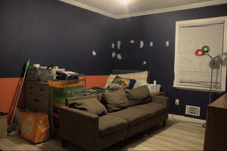 1757 Litchfield Road Southwest Snellville, GA 30078 - Photo 11 of 17 a bedroom with furniture and wooden floor