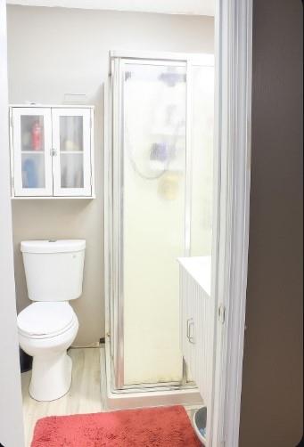 1757 Litchfield Road Southwest Snellville, GA 30078 - Photo 6 of 17 a bathroom with a toilet and a shower