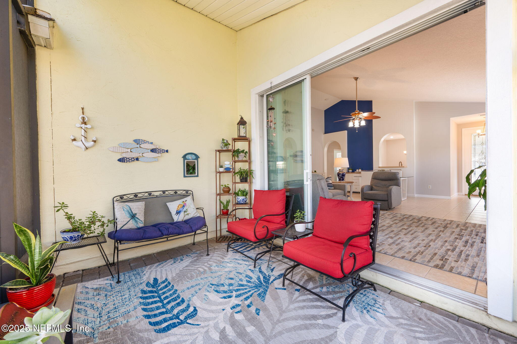 697 Copperhead Circle St. Augustine, FL 32092 - Photo 21 of 26 a living room with furniture and a rug