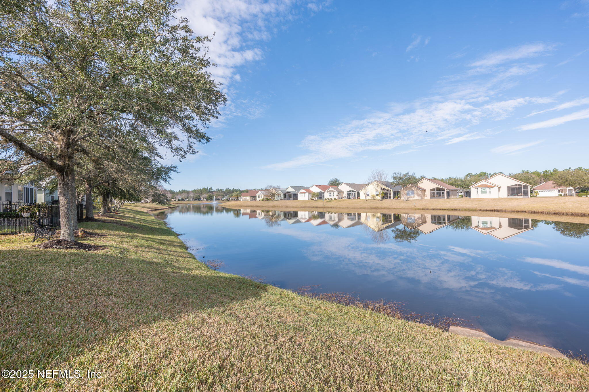 697 Copperhead Circle St. Augustine, FL 32092 - Photo 24 of 26 a view of a lake with houses