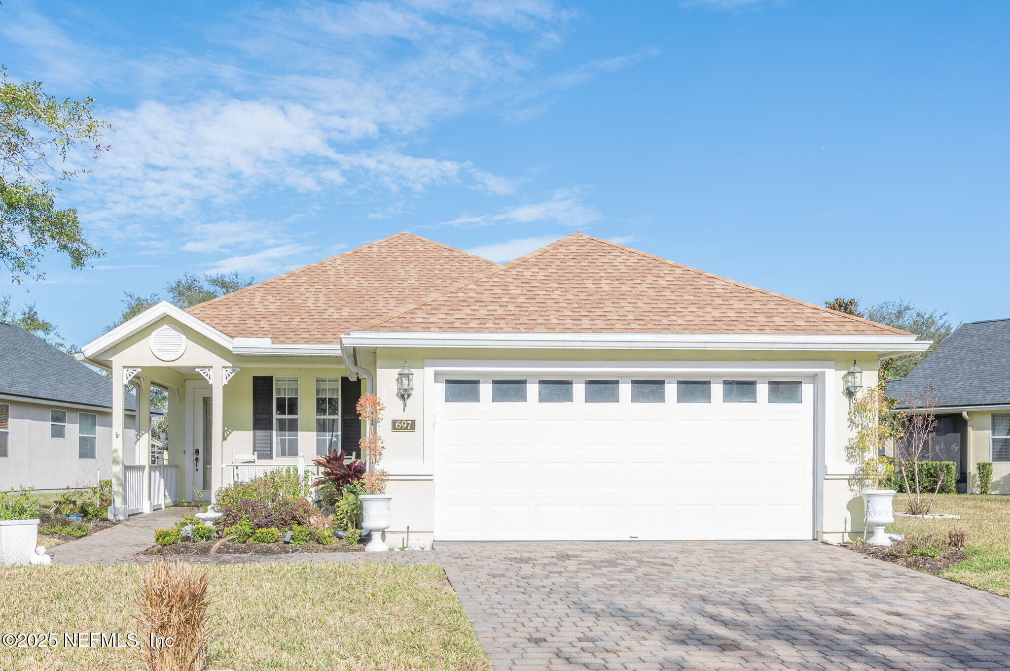 697 Copperhead Circle St. Augustine, FL 32092 - Photo 3 of 26 front view of a house with a yard