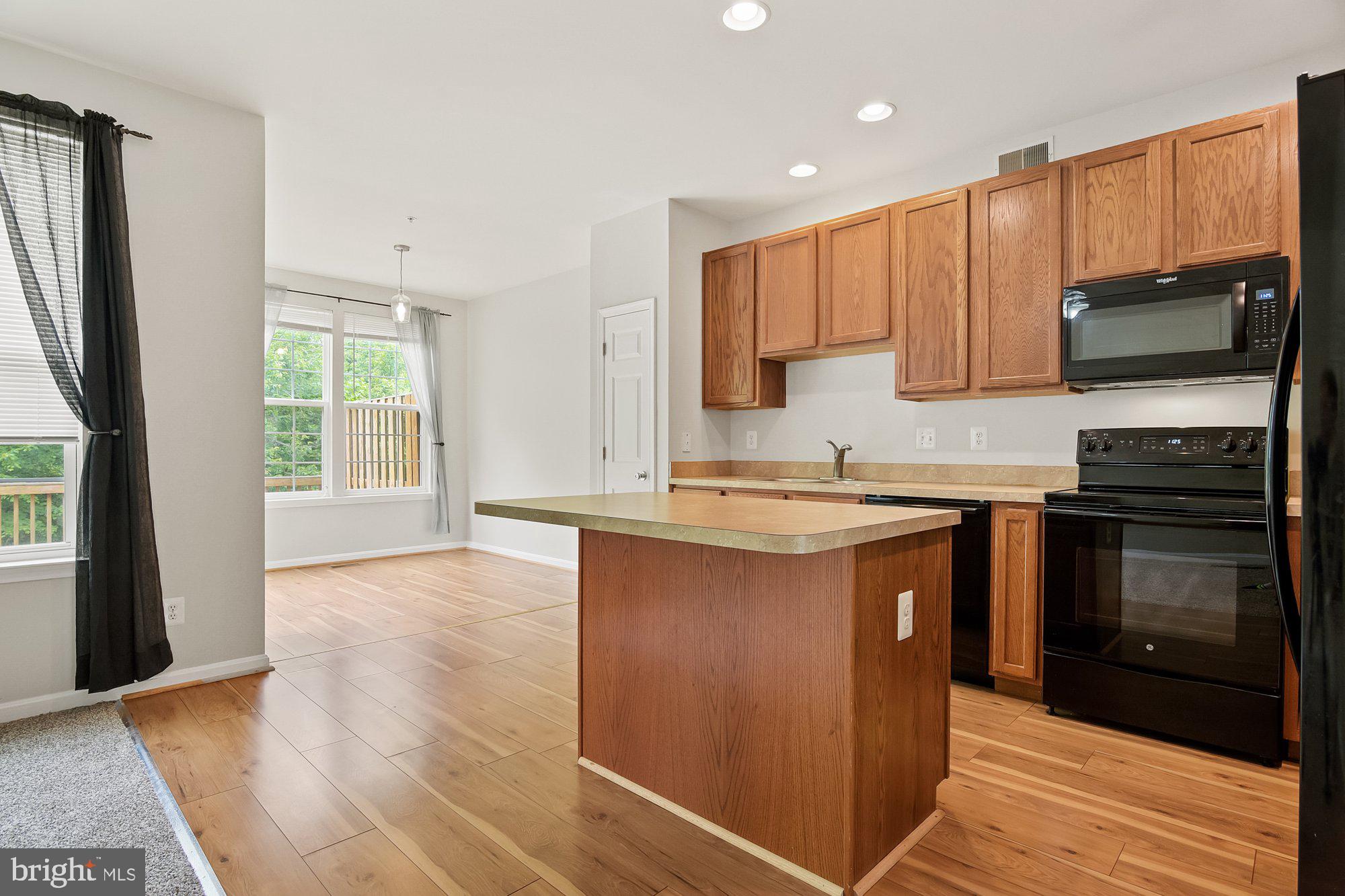 1948 Waltman Road Edgewood, MD 21040 - Photo 5 of 32 New fixtures & high-quality wide-plank laminate