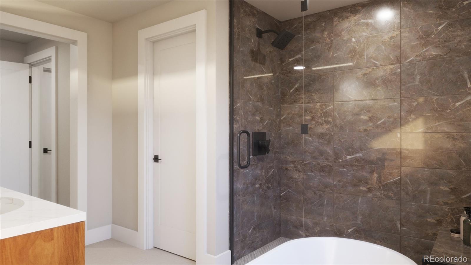 982 Locust Avenue Boulder, CO 80304 - Photo 27 of 29 a bathroom with a toilet and a shower