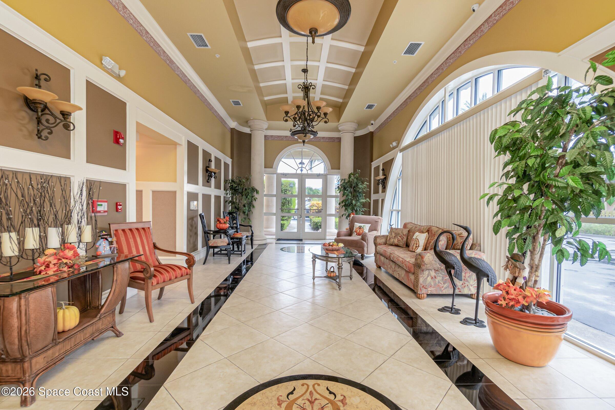 4975 Dixie Highway Northeast, Unit 301 Palm Bay, FL 32905 - Photo 12 of 61 4975-Dixie-Venetian Bay Lobby