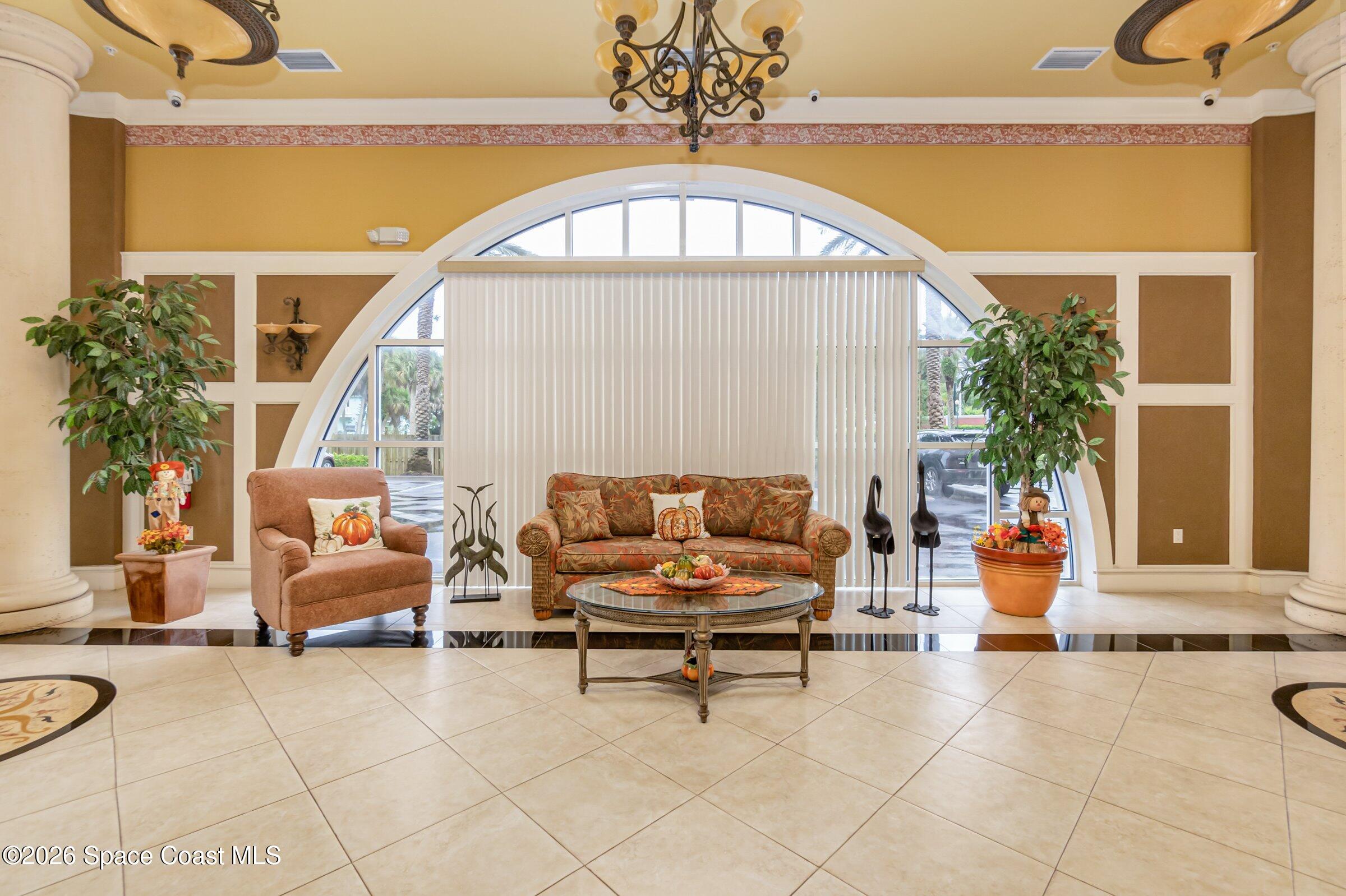 4975 Dixie Highway Northeast, Unit 301 Palm Bay, FL 32905 - Photo 13 of 61 4975-Dixie-Venetian Bay Lobby 2